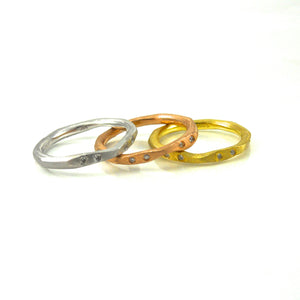 14k gold stacking rings in rose, white, and yellow-gold 