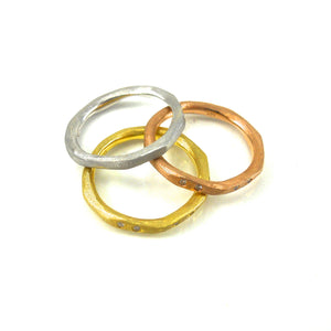 14k gold stacking rings in rose, white, and yellow-gold with diamond accents