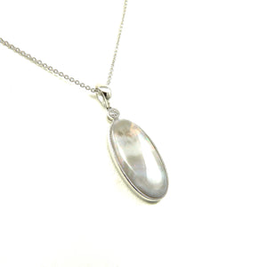 handcrafted austrialian gray Opal pendant set in 14k white gold with diamond accent