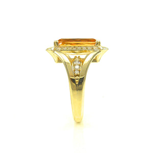 Imperial Topaz center stone with round brilliant cut diamond accent ring