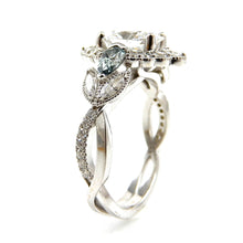 Load image into Gallery viewer, Detail view of Oval Cut Diamond with Scalloped Halo and Accented Twisted Band Engagement Ring