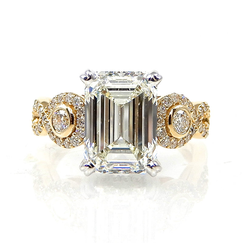 Emerald Cut Diamond with Round Accents Engagement Ring