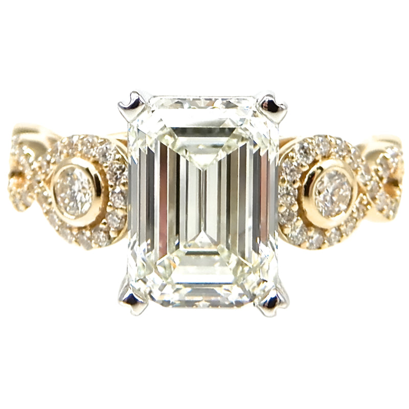 Emerald Cut Diamond with Round Accents Engagement Ring