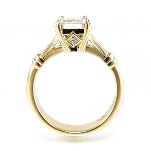 Emerald Cut Diamond Engagement Ring with hidden princess cut side detail
