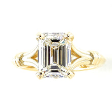 Load image into Gallery viewer, Gold ring with emerald-cut diamond