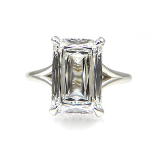 Emerald Cut Solitaire with Hidden Halo with split shank