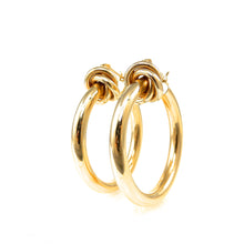 Load image into Gallery viewer, Gold hoop earrings on a white background