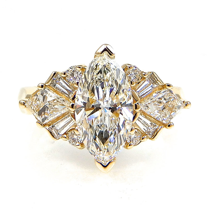 Marquis Center Stone with Kite Side Stones and Baguette Accents Engagement Ring
