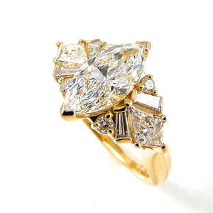 Marquis Center Stone with Kite Side Stones and Baguette Accents Engagement Ring