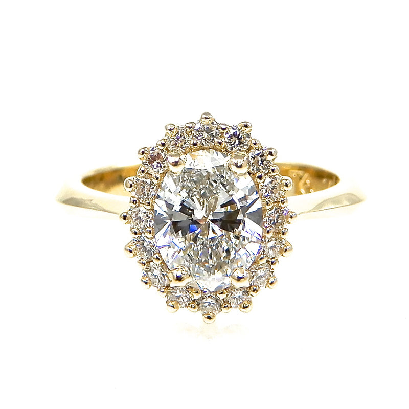 Oval Cut Center Stone with Diamond Halo