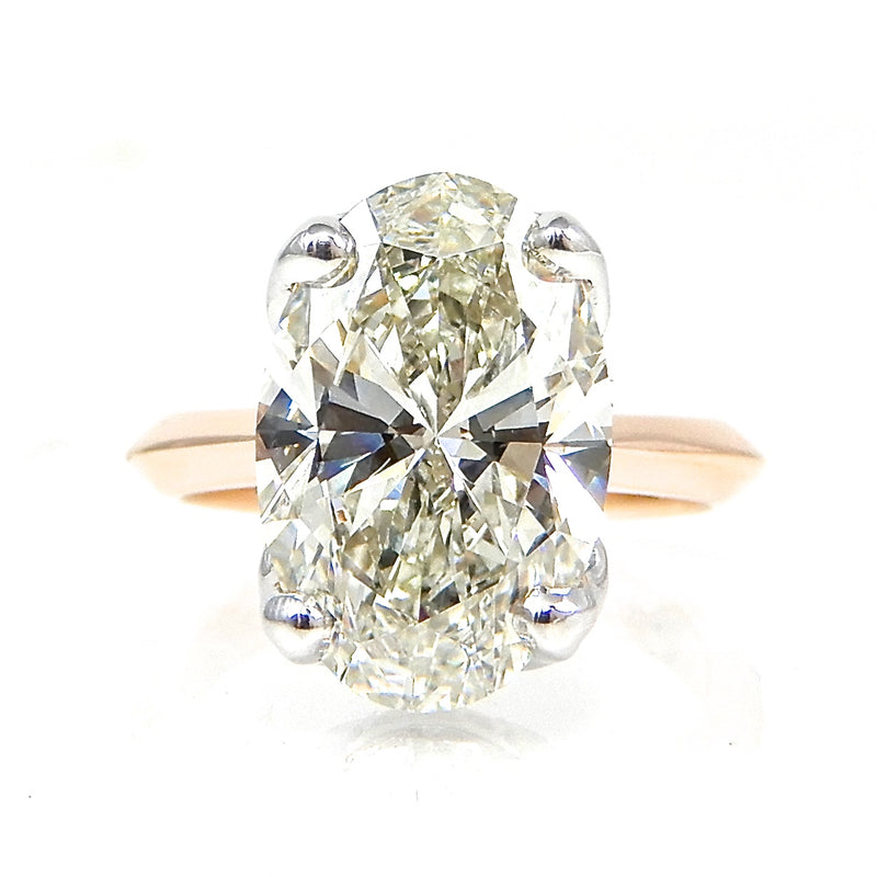 Oval Cut Diamond with Hidden Halo Rose Gold Engagement Ring
