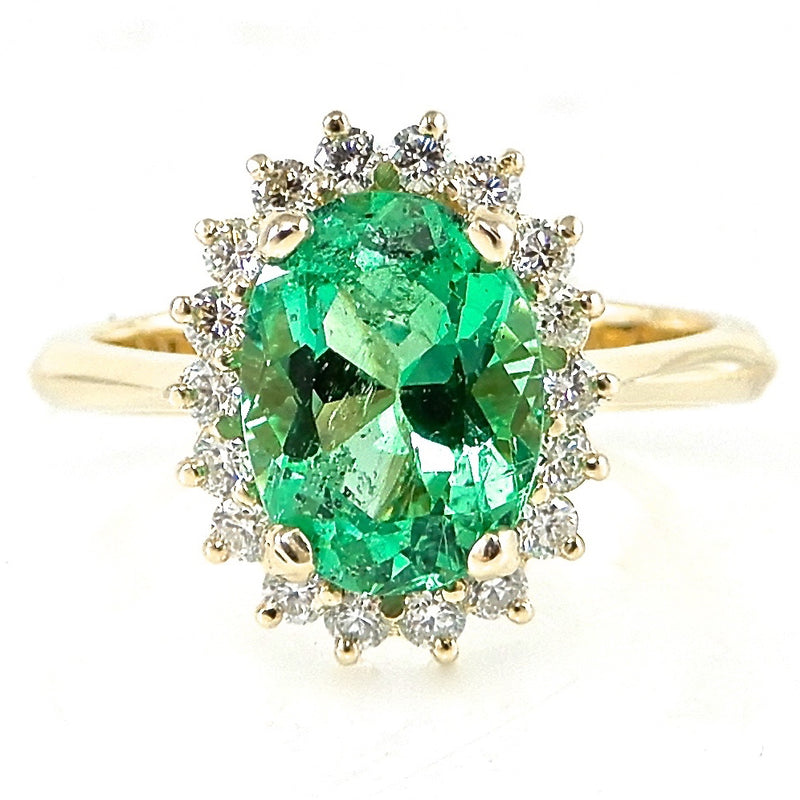 Oval Cut Emerald with Diamond Halo Engagement Ring