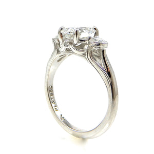 Oval Diamond with Round Side Stones Engagement Ring
