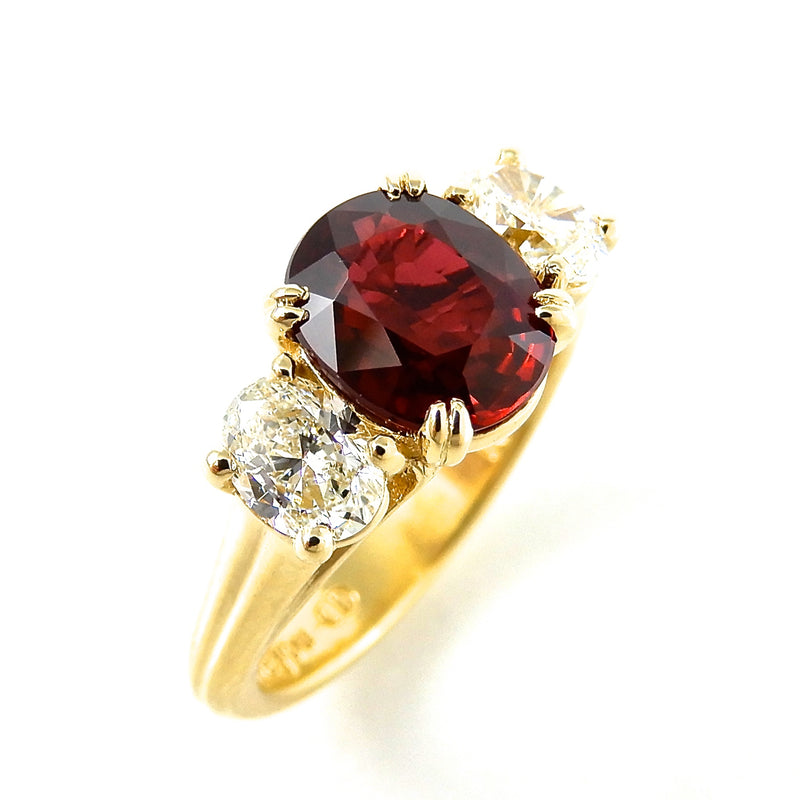 Oval Ruby Three Stone Engagement Ring