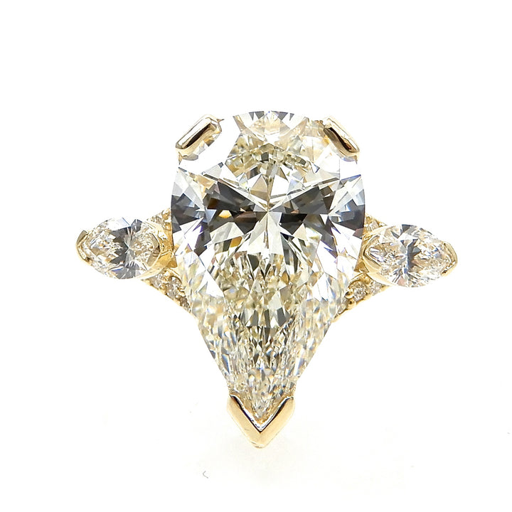 Pear Cut Diamond with Marquis Accent Stones Engagement Ring