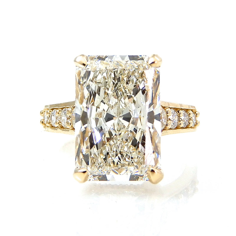 Radiant Cut Solitaire with Hidden Halo and Graduated Diamond Band