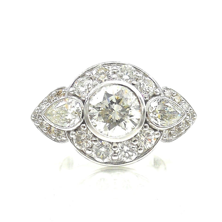 Round Bezel Set Diamond with Pear Accents and round diamond halo Engagement Ring