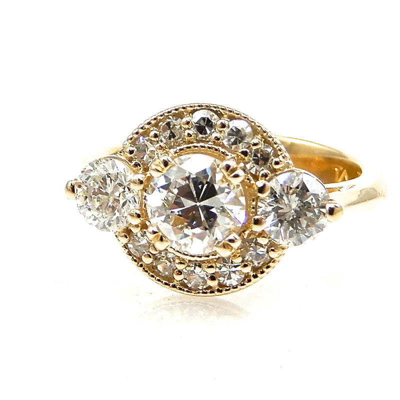 Round Cut Diamond Three Stone Engagement Ring with Halo