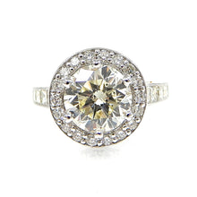 Load image into Gallery viewer, Round Cut Diamond with Diamond Halo and Princess Cut Accent Engagement Ring