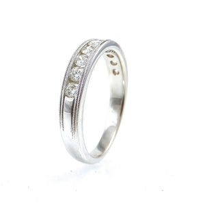 Round Cut Diamond Channel Milgrain Band