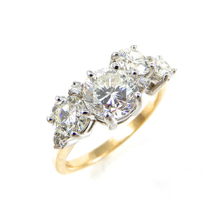 Round Diamond Engagement Ring featuring multiple sized stones