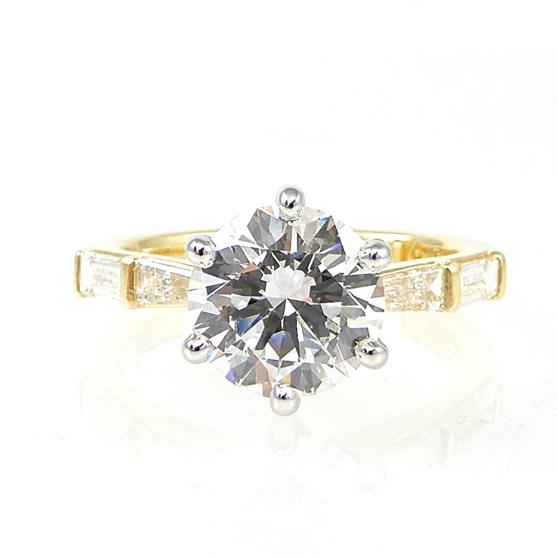 Round Diamond Solitaire Engagement Ring with Baguette Accents