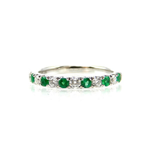 Alternating round emerald and round diamond band style white gold ring