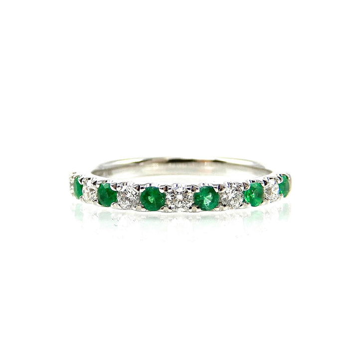 Alternating round emerald and round diamond band style white gold ring