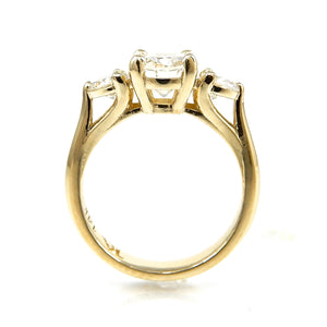 Round Three Stone Engagement Ring