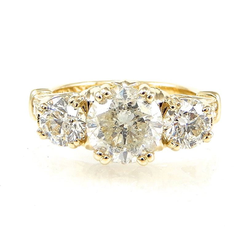 Round Three Stone Tulip Set Engagement Ring