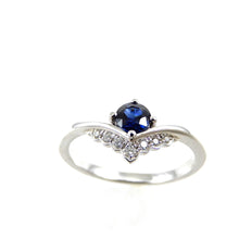 Load image into Gallery viewer, &quot;v&quot; shape white gold band with single blue sapphire and crown style round diamond accents