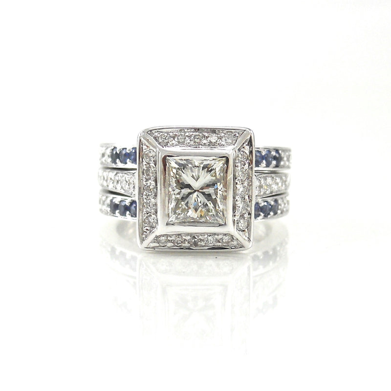 bezel-set princess cut diamond engagement ring with sapphire accents