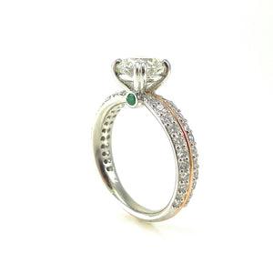 Diamond Engagement Ring with Emerald Accents