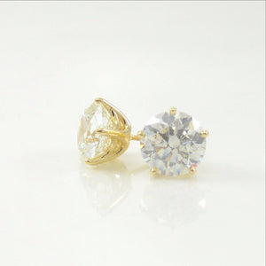 4.02ct diamond studs featured in custom-designed 14k yellow-gold baskets