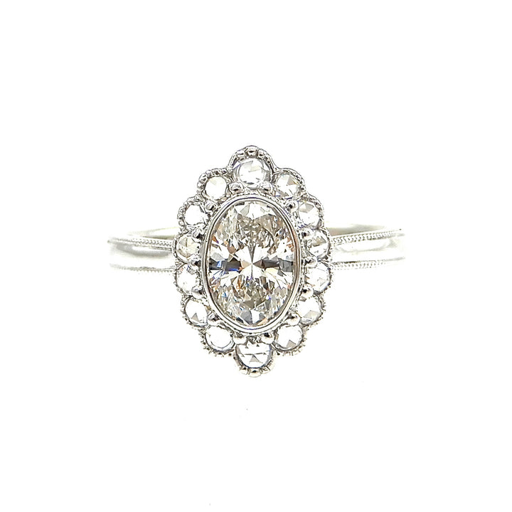 custom scalloped diamond halo with milgrain detailing engagement ring