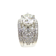 Load image into Gallery viewer, round brilliant cut diamond center stone ring with a pave diamond accented shank and diamond borders