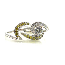 Load image into Gallery viewer, prong-set center stone and diamond accented bypass-style shank 