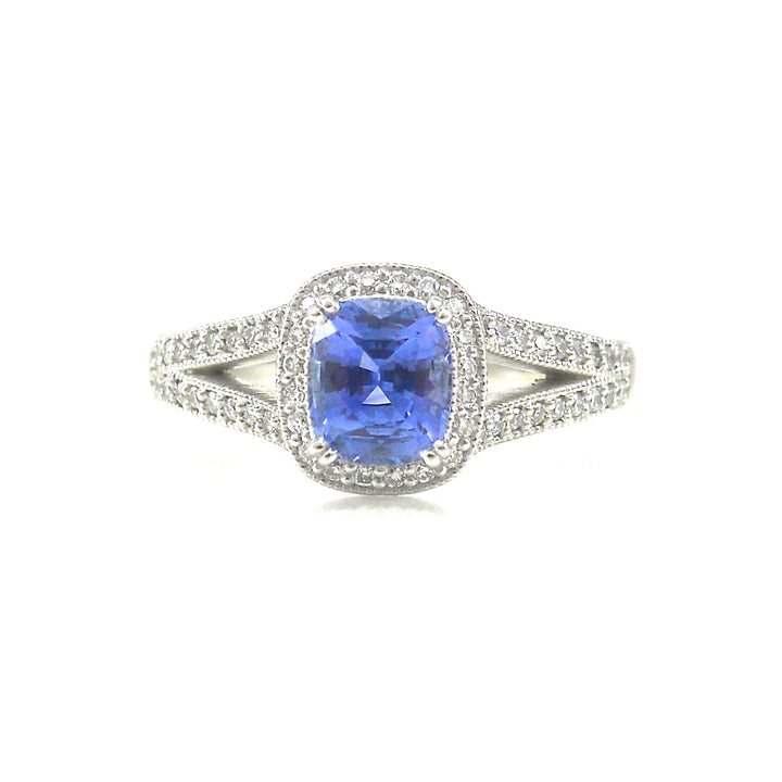 cushion cut sapphire engagement ring with diamond split shank