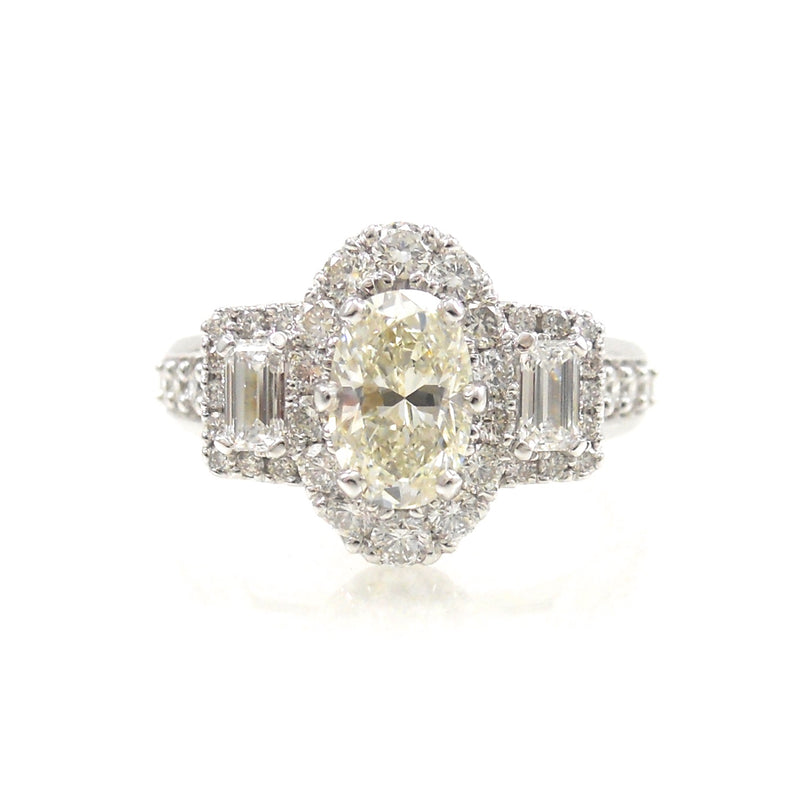 three stone halo diamond engagement ring