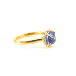 Sapphire halo engagement ring yellow gold
