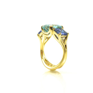 custom aquamarine and sapphire ring in yellow gold