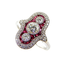 Load image into Gallery viewer, Vintage inspired cockatil ring with three round diamonds surrounded by rubies and an elongated diamond halo in white gold