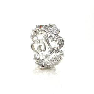 Custom Scrollwork and Miligrain Diamond Ring