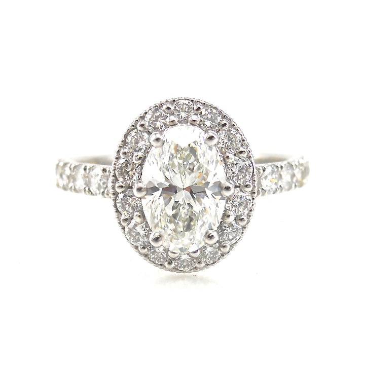 custom prong set diamond halo with diamond accents